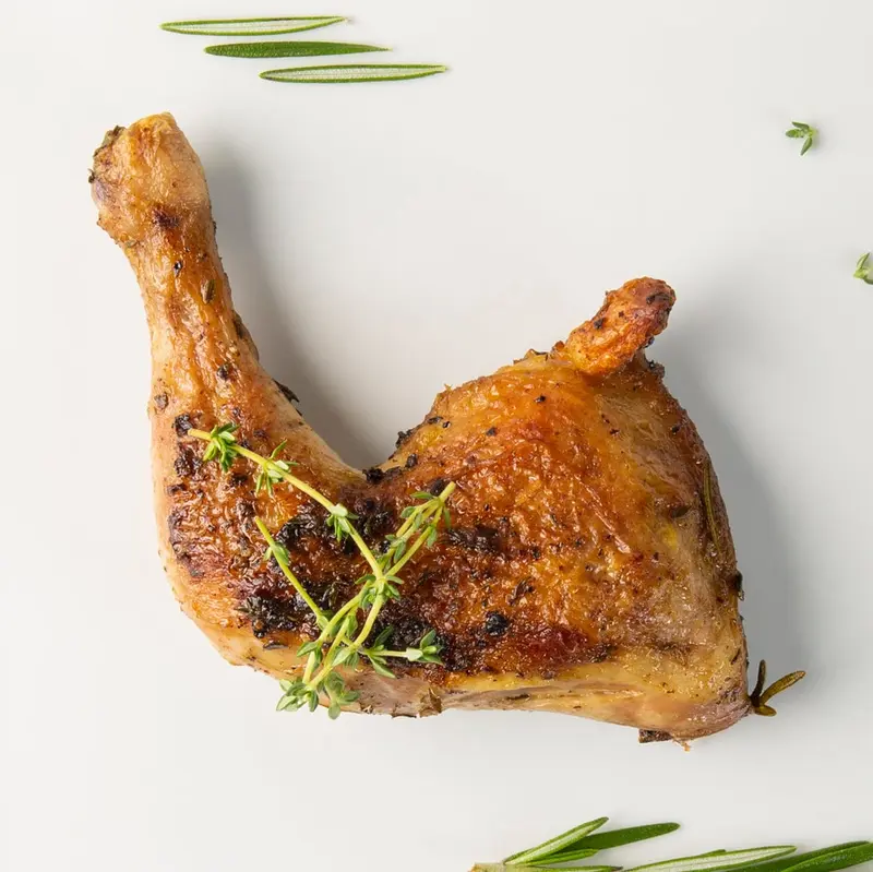 Oven-roasted chicken leg quarter