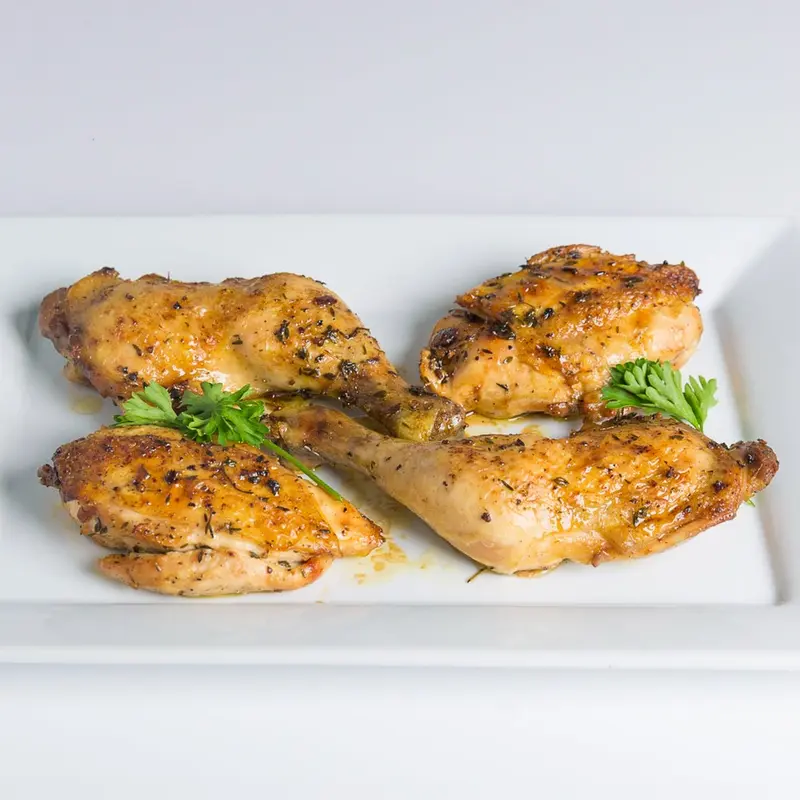 Herb-roasted chicken on a serving platter