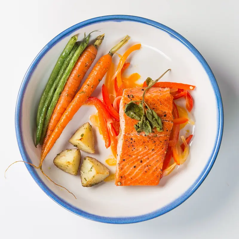 Pan-roasted salmon with glazed carrots, green beans and roasted potatoes