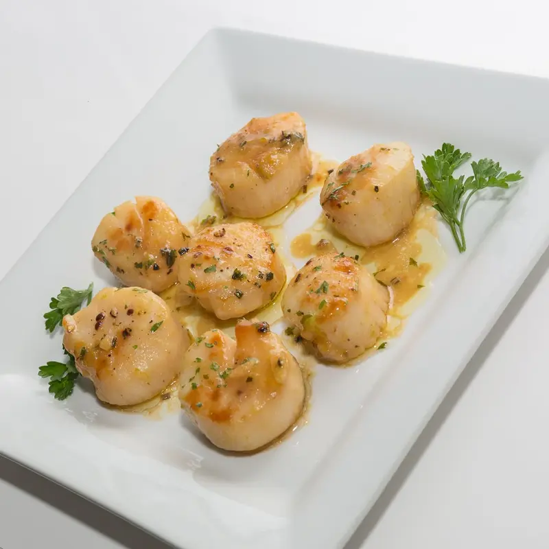 Seared scallops in butter sauce