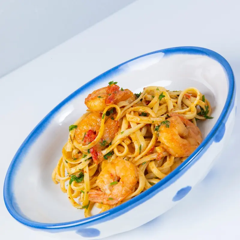 Shrimp pasta in a creamy tomato garlic sauce