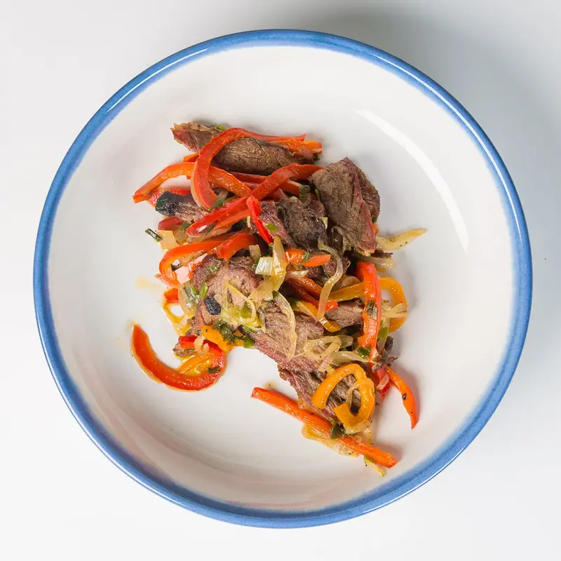 Suya-spiced beef with charred peppers